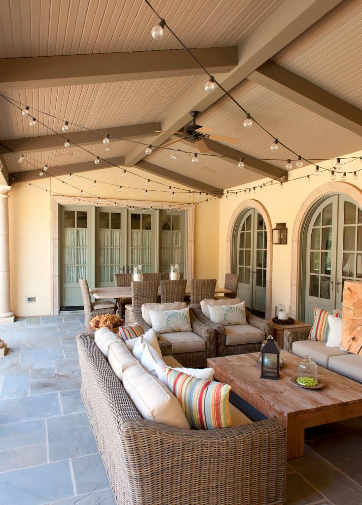 Inspiration for a mediterranean porch remodel in Other with a roof extension by Jack Arnold Companies | Outdoor Photos | Porch | Landscaping | Landscape Design | Outdoor Living Space | Porch Design Ideas | Outdoor Living Space Ideas | Backyard Design