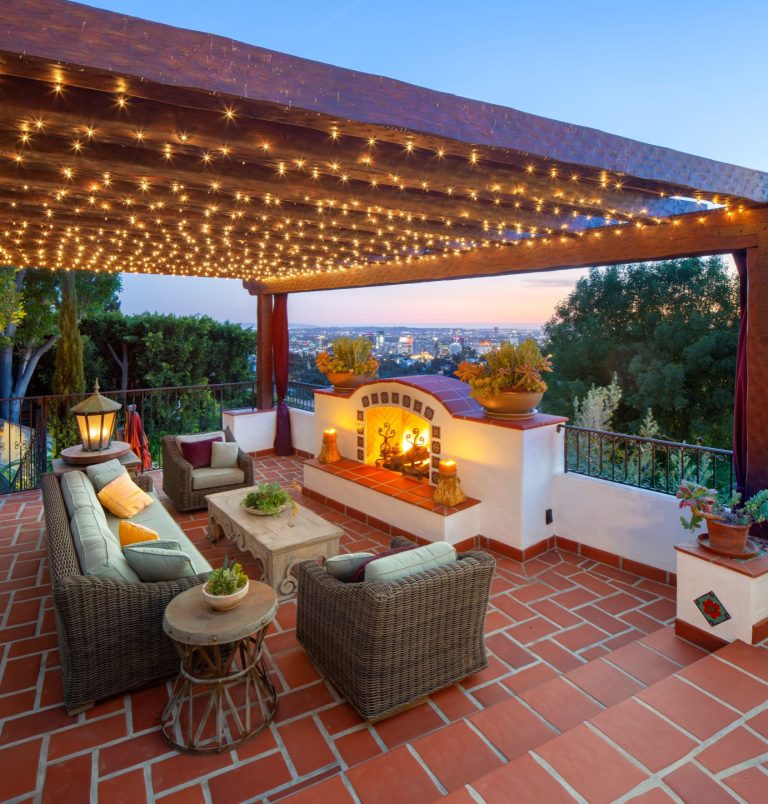 Inspiration for a mediterranean second story metal railing deck remodel in Los Angeles with a pergola