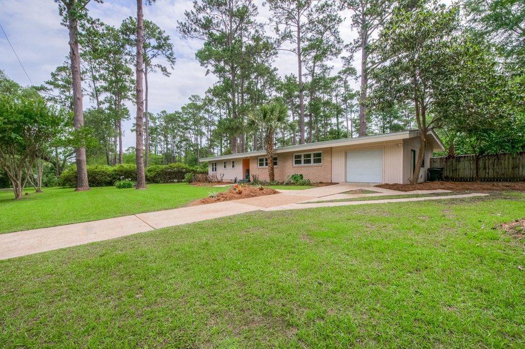 Inspiration for a mid-century modern porch remodel in Other by Style & Sold | Outdoor Photos | Porch | Landscaping | Landscape Design | Outdoor Living Space | Porch Design Ideas | Outdoor Living Space Ideas | Backyard Design
