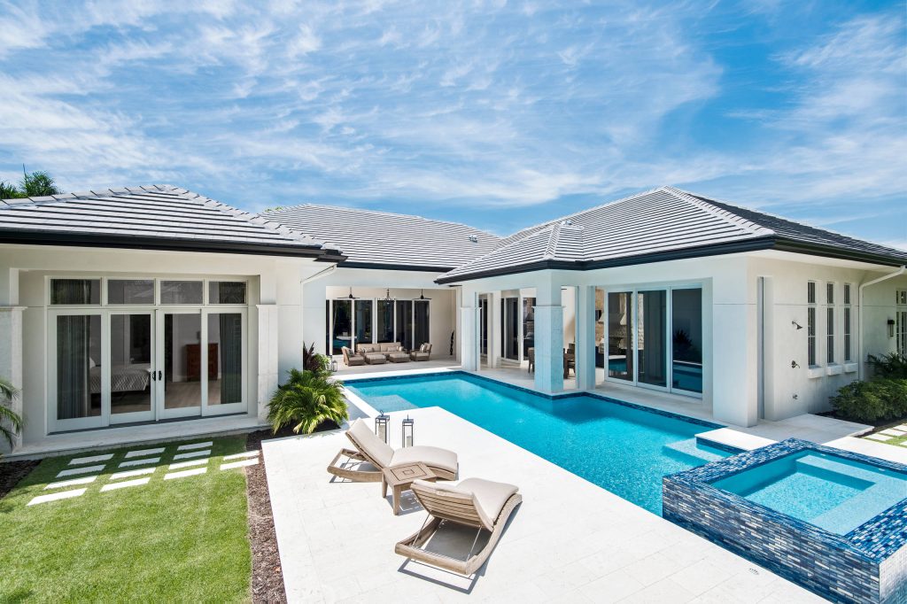 Inspiration for a mid-sized backyard custom-shaped pool remodel in Other