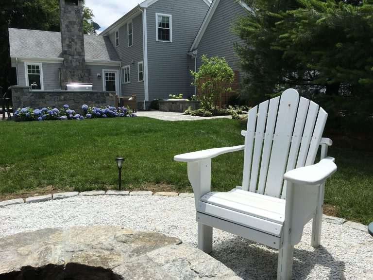 Inspiration for a mid-sized coastal concrete porch remodel in Providence
