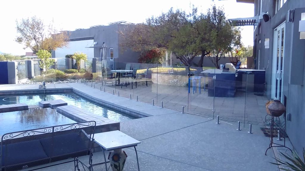 Inspiration for a mid-sized contemporary backyard concrete patio kitchen remodel in Phoenix with no cover