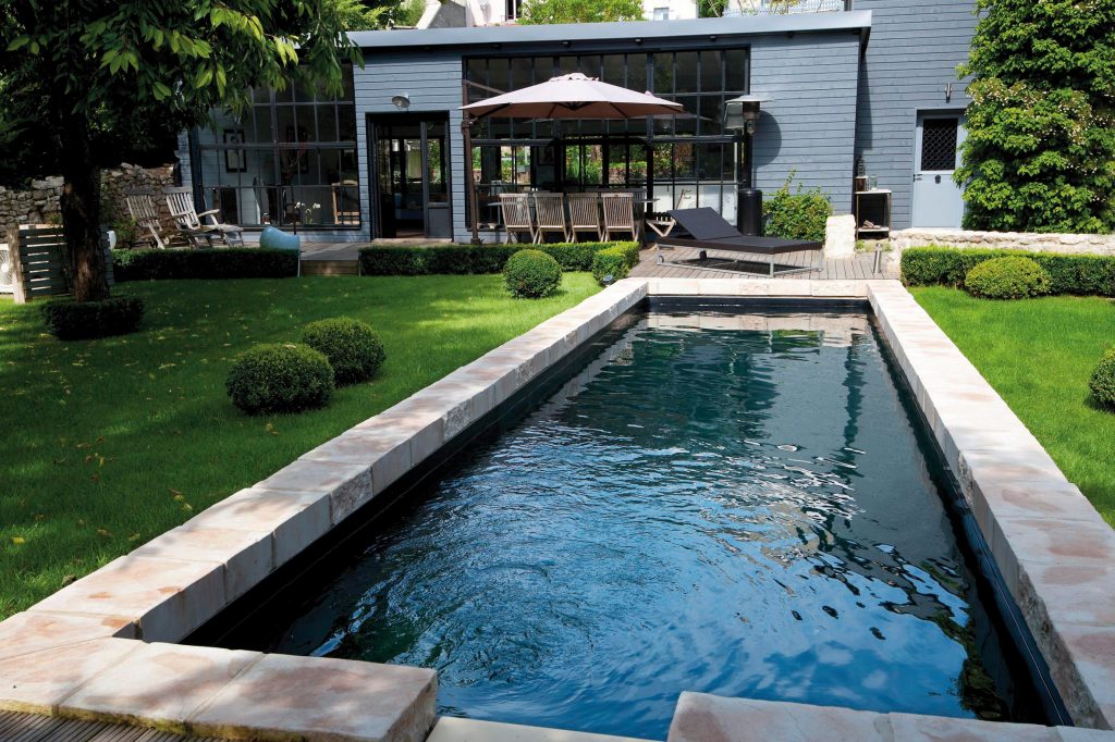 Inspiration for a mid-sized contemporary backyard concrete paver and rectangular lap pool remodel in Atlanta