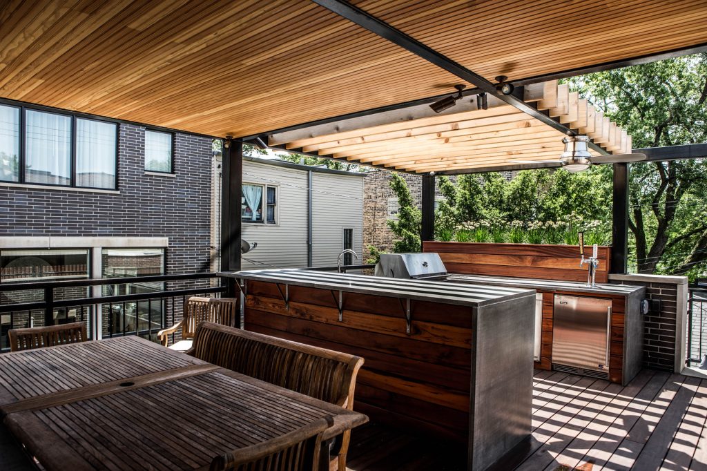 Inspiration for a mid-sized contemporary backyard outdoor kitchen deck remodel in Orange County with a pergola