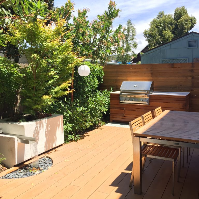 Inspiration for a mid-sized contemporary backyard outdoor kitchen deck remodel in San Francisco with no cover