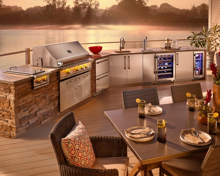 Inspiration for a mid-sized contemporary backyard patio kitchen remodel in Atlanta with decking and no cover