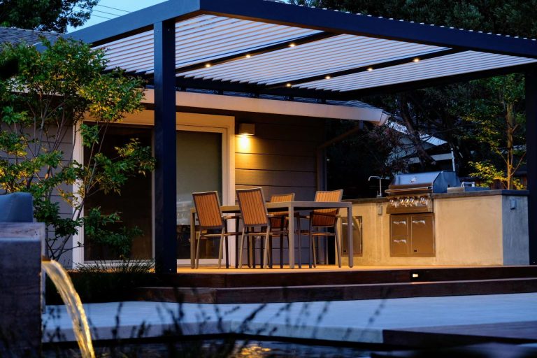 Inspiration for a mid-sized contemporary backyard patio kitchen remodel in San Francisco with a pergola