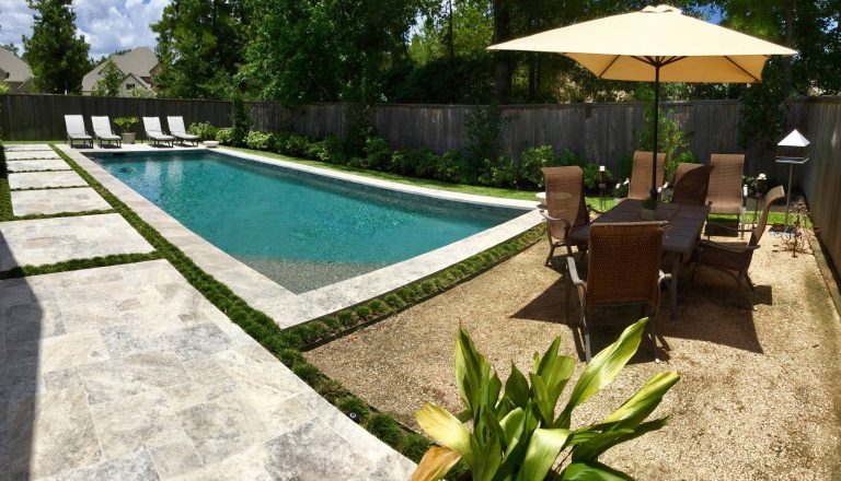 Inspiration for a mid-sized contemporary backyard stone and rectangular lap pool remodel in Houston
