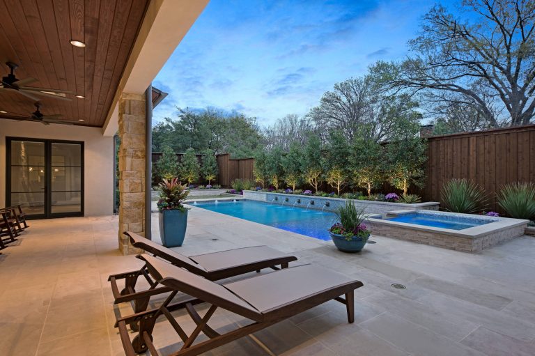 Inspiration for a mid-sized contemporary backyard tile and rectangular lap pool fountain remodel in Dallas