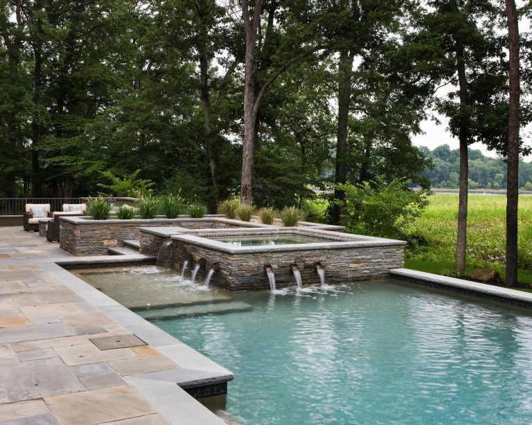 Inspiration for a mid-sized contemporary backyard tile and rectangular lap pool fountain remodel in Philadelphia