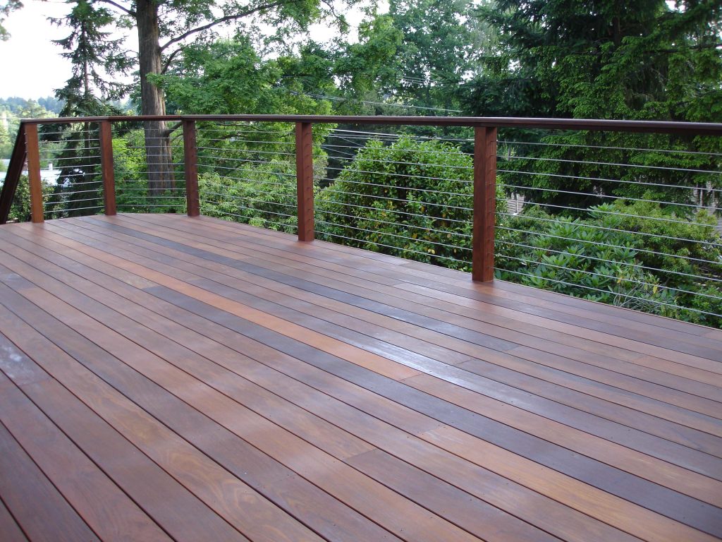 Inspiration for a mid-sized contemporary side yard deck remodel in Portland with no cover