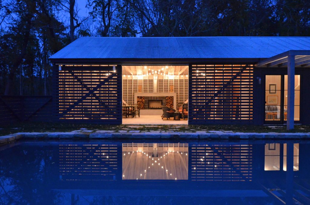 Inspiration for a mid-sized cottage backyard stone and rectangular natural pool house remodel in New York