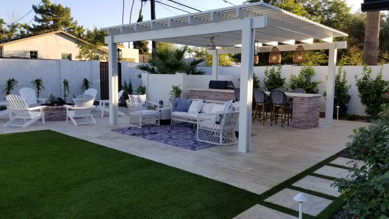 Inspiration for a mid-sized country backyard tile patio kitchen remodel in Phoenix with a pergola