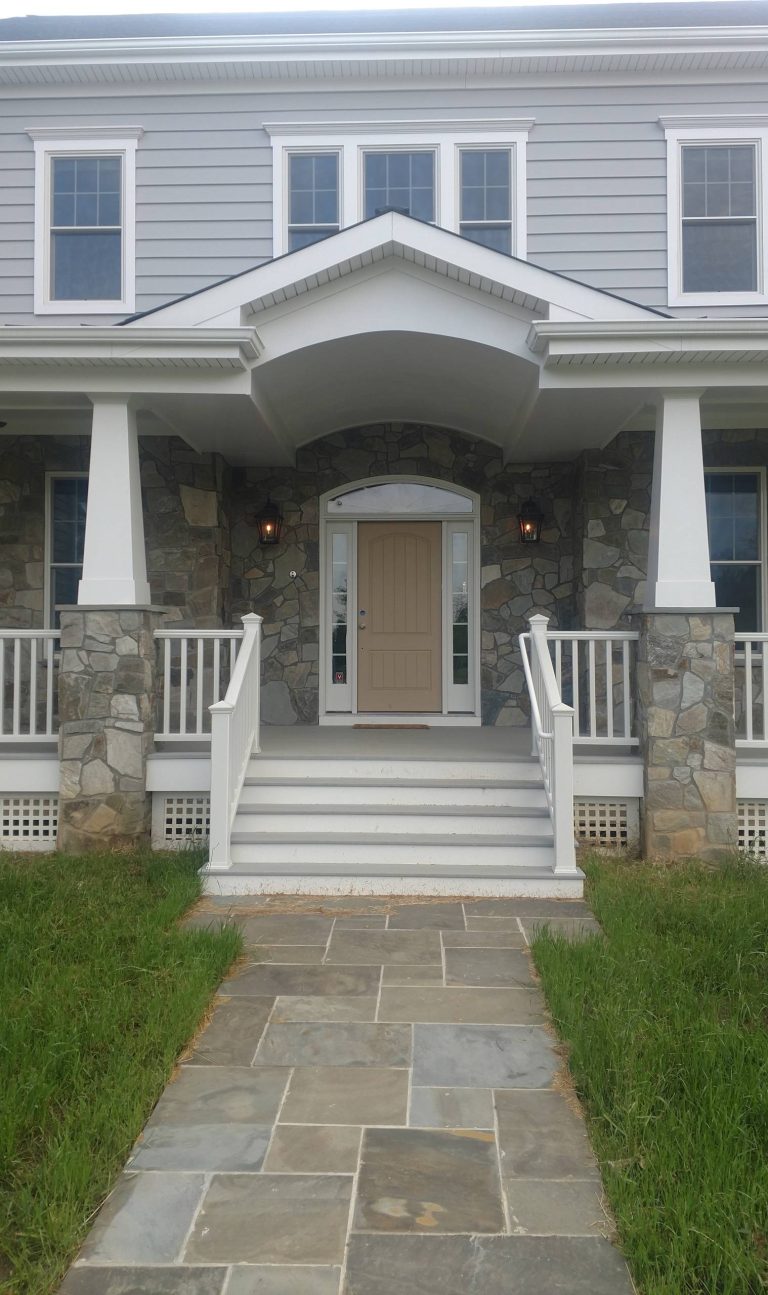 Inspiration for a mid-sized country front porch remodel in DC Metro with decking and a roof extension by Cumberland Custom Homes | Outdoor Photos | Porch | Landscaping | Landscape Design | Outdoor Living Space | Porch Design Ideas | Outdoor Living Space Ideas | Backyard Design