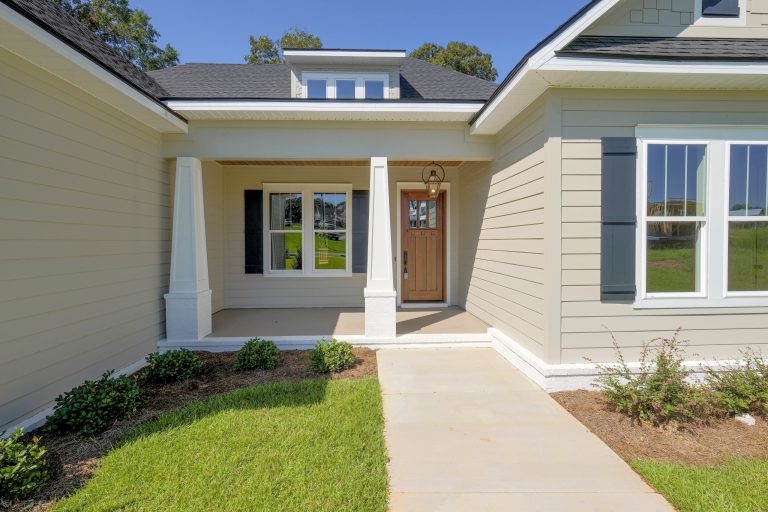 Inspiration for a mid-sized craftsman front porch remodel in New Orleans with a roof extension by ARK Builders | Outdoor Photos | Porch | Landscaping | Landscape Design | Outdoor Living Space | Porch Design Ideas | Outdoor Living Space Ideas | Backyard Design