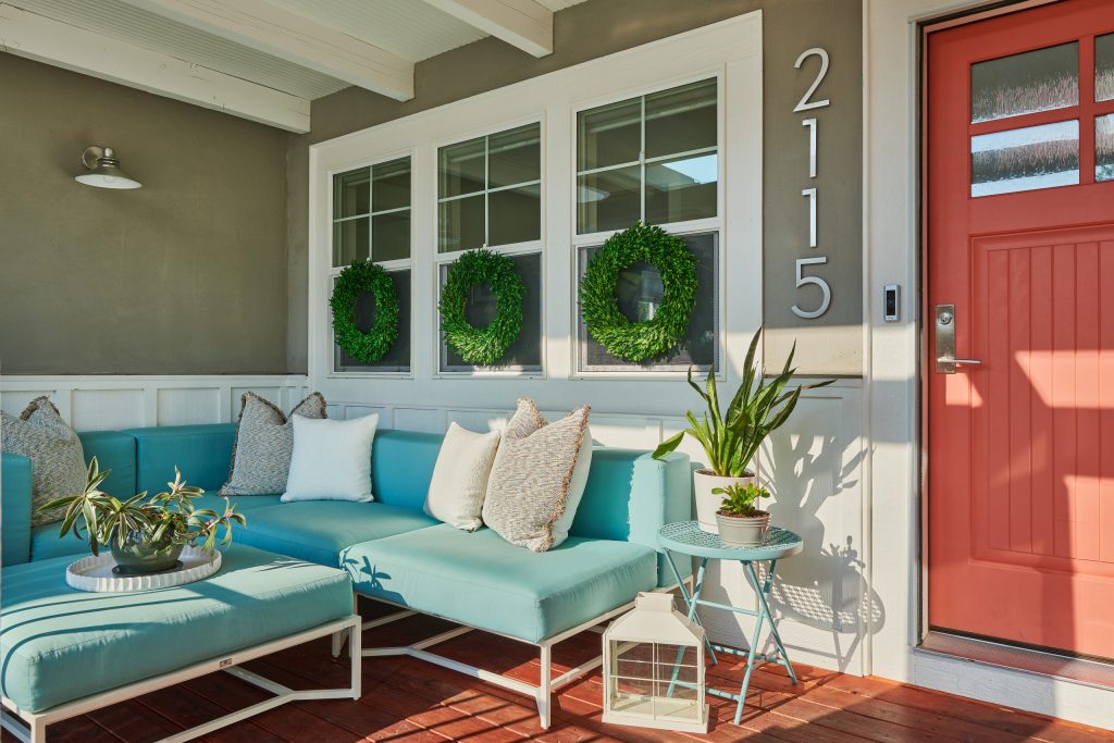 Inspiration for a mid-sized craftsman metal railing porch remodel in Denver with decking and a roof extension by LIBERTY DESIGN + BUILD | Outdoor Photos | Porch | Landscaping | Landscape Design | Outdoor Living Space | Porch Design Ideas | Outdoor Living Space Ideas | Backyard Design