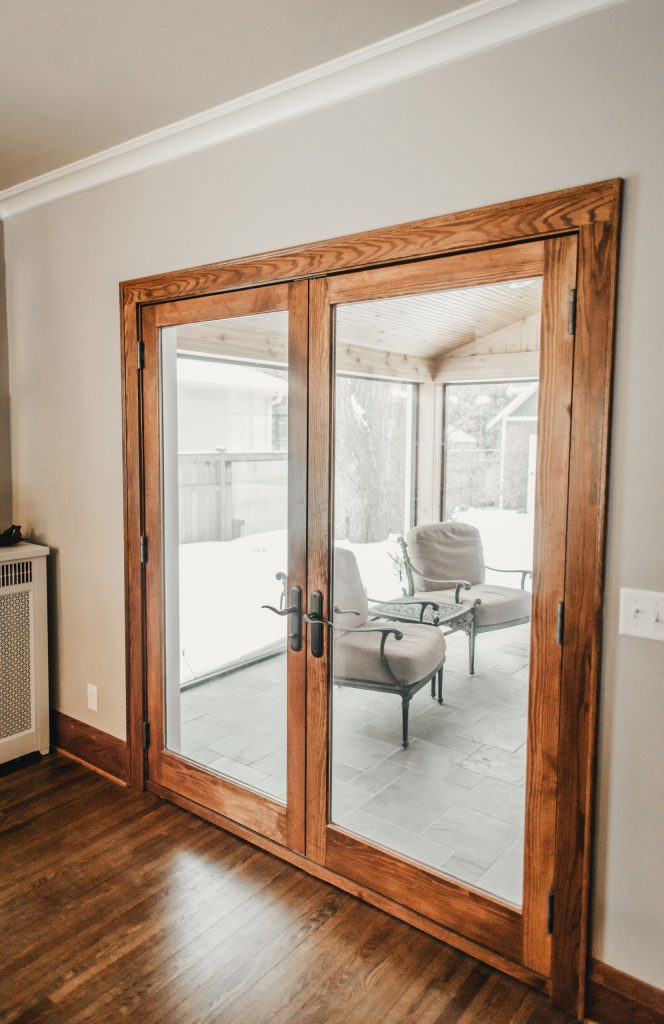 Inspiration for a mid-sized craftsman tile back porch remodel in Minneapolis with a fireplace and a roof extension by Niedfeldt Home Remodeling | Outdoor Photos | Porch | Landscaping | Landscape Design | Outdoor Living Space | Porch Design Ideas | Outdoor Living Space Ideas | Backyard Design