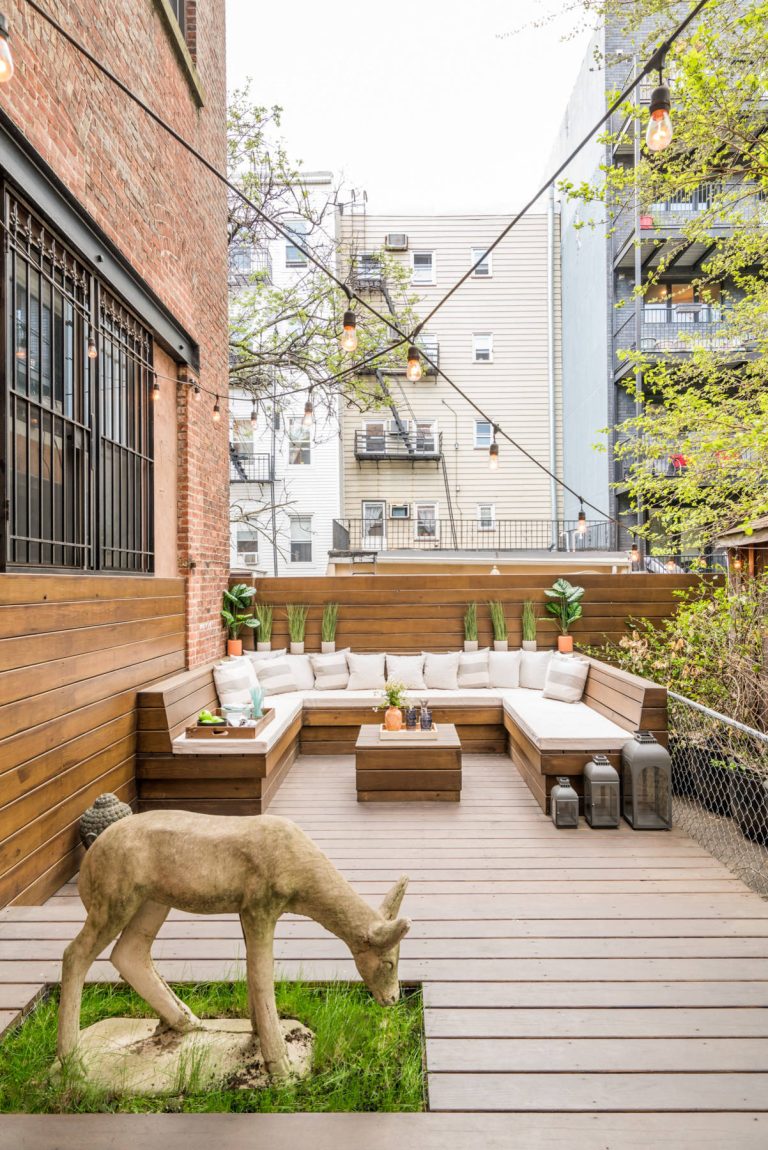 Inspiration for a mid-sized eclectic backyard deck remodel in New York with a fire pit and no cover
