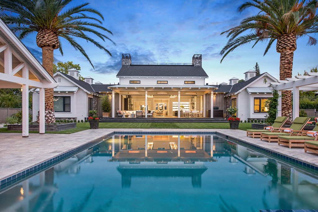 Inspiration for a mid-sized farmhouse backyard stone and rectangular pool house remodel in San Francisco
