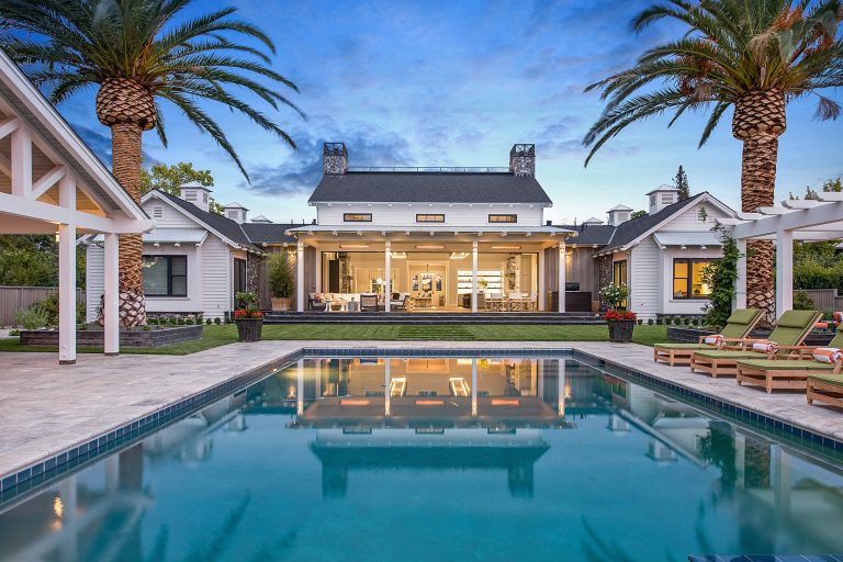 Inspiration for a mid-sized farmhouse backyard stone and rectangular pool house remodel in San Francisco