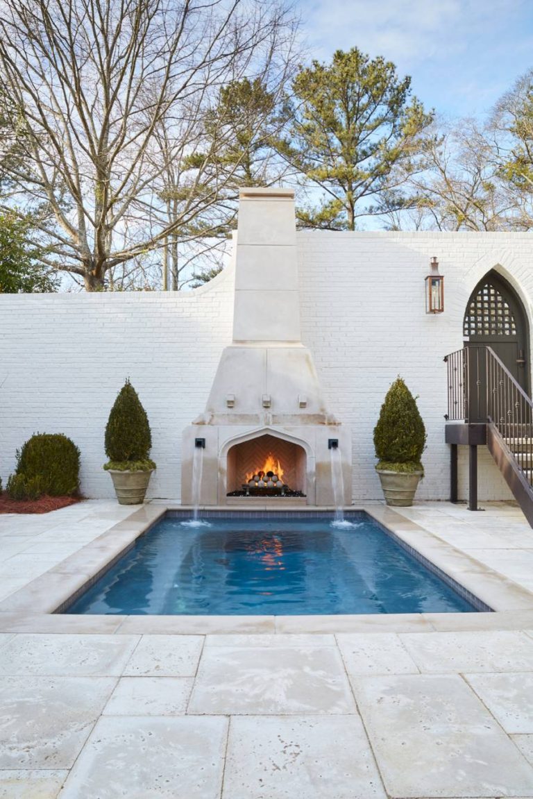 Inspiration for a mid-sized mediterranean backyard concrete paver and rectangular pool fountain remodel in Birmingham