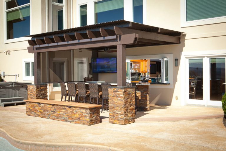 Inspiration for a mid-sized mediterranean concrete back porch remodel in Louisville with a pergola by American Louvered Roof Systems | Outdoor Photos | Porch | Landscaping | Landscape Design | Outdoor Living Space | Porch Design Ideas | Outdoor Living Space Ideas | Backyard Design