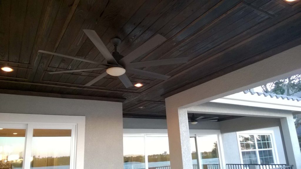 Inspiration for a mid-sized mediterranean tile porch remodel in Tampa with a roof extension