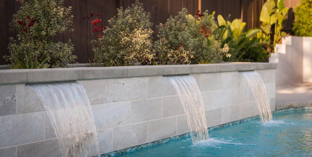 Inspiration for a mid-sized modern backyard concrete and kidney-shaped natural hot tub remodel in San Diego