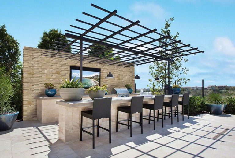 Inspiration for a mid-sized modern backyard tile patio kitchen remodel in Philadelphia with a pergola
