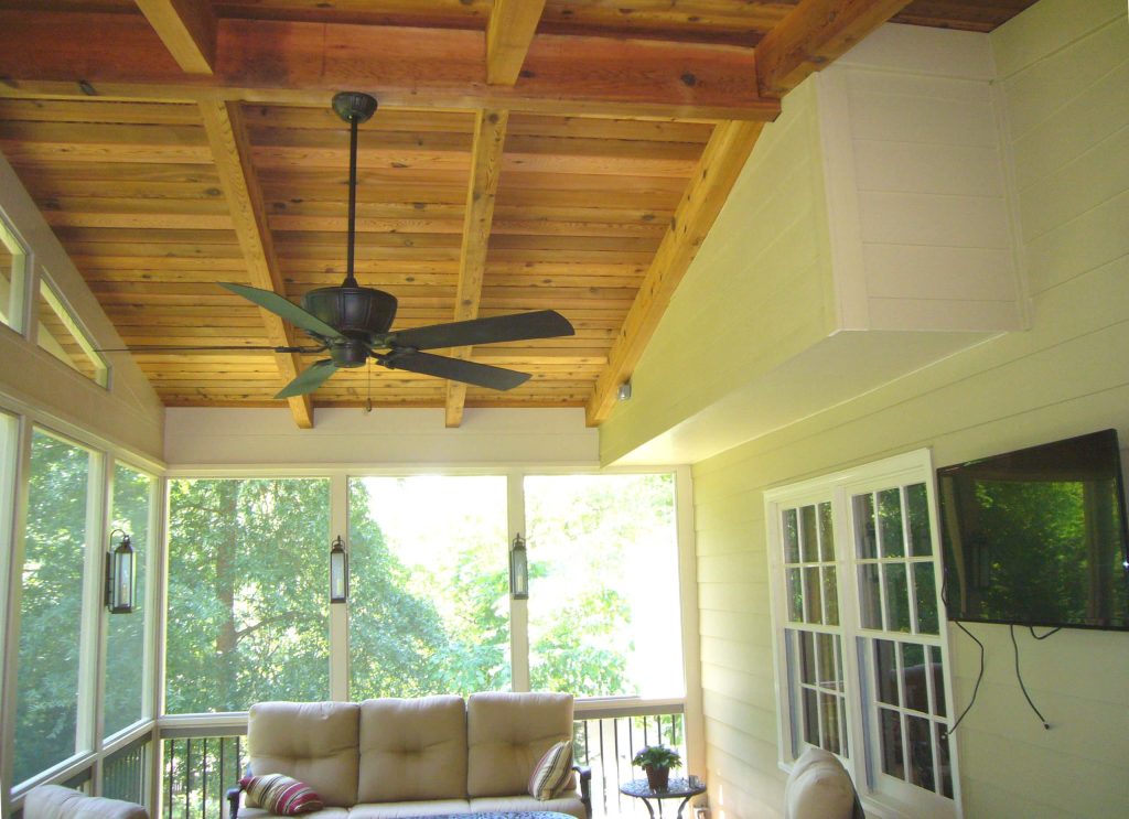 Inspiration for a mid-sized timeless back porch remodel in Atlanta with a roof extension by Synergy Outdoor | Outdoor Photos | Porch | Landscaping | Landscape Design | Outdoor Living Space | Porch Design Ideas | Outdoor Living Space Ideas | Backyard Design