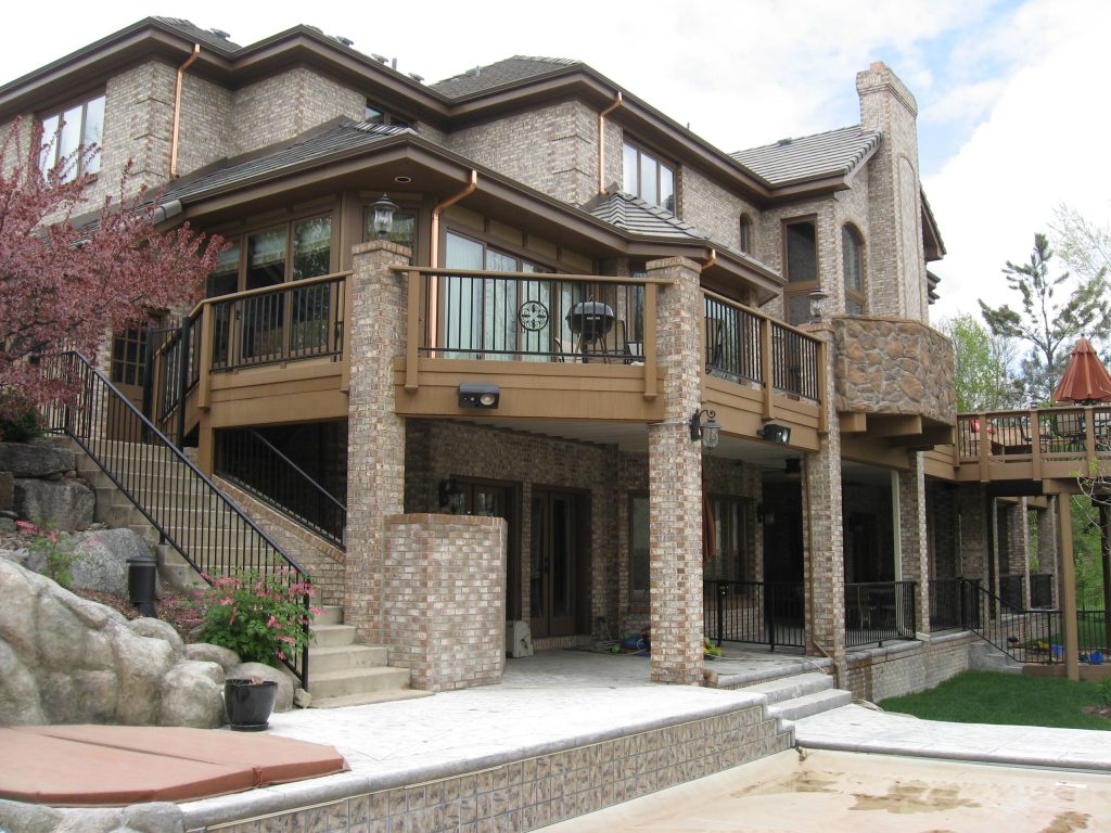 Inspiration for a mid-sized timeless backyard outdoor kitchen deck remodel in Denver with no cover