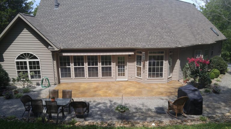 Inspiration for a mid-sized timeless backyard stamped concrete patio kitchen remodel in Other with no cover