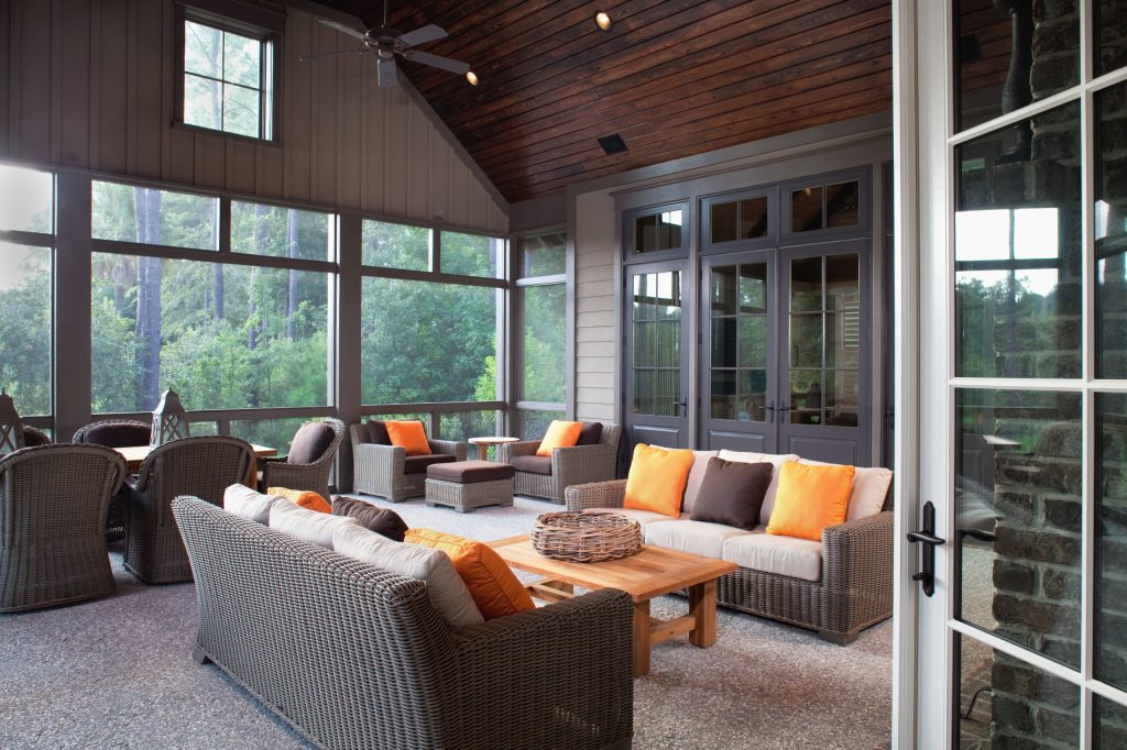 Inspiration for a mid-sized timeless concrete back porch remodel in Charleston with a roof extension by Court Atkins Group | Outdoor Photos | Porch | Landscaping | Landscape Design | Outdoor Living Space | Porch Design Ideas | Outdoor Living Space Ideas | Backyard Design