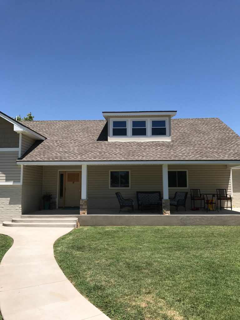 Inspiration for a mid-sized timeless concrete front porch remodel in Austin by The Window Guys Of The Hill Country | Outdoor Photos | Porch | Landscaping | Landscape Design | Outdoor Living Space | Porch Design Ideas | Outdoor Living Space Ideas | Backyard Design