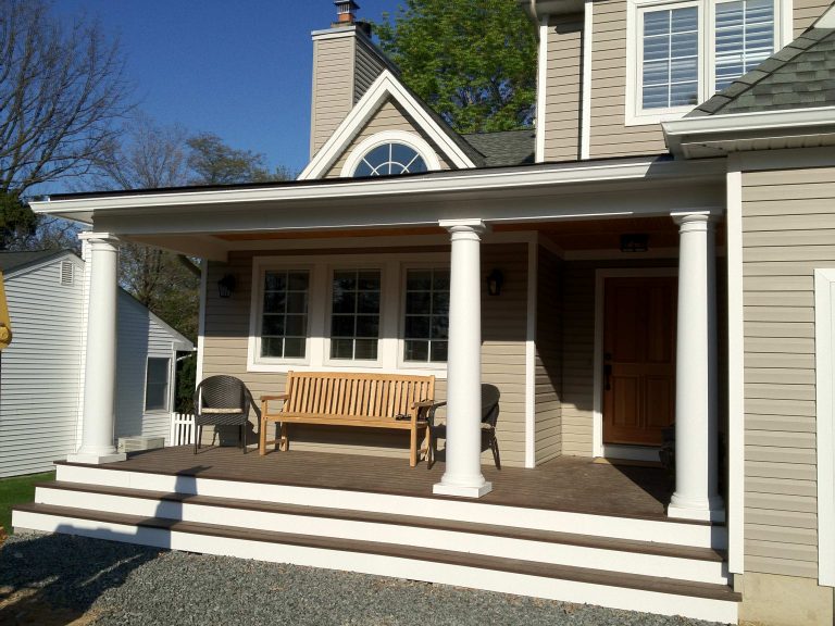 Inspiration for a mid-sized timeless front porch remodel in New York with a roof extension by Peter M. Hestevold, DBC&M,LLC | Outdoor Photos | Porch | Landscaping | Landscape Design | Outdoor Living Space | Porch Design Ideas | Outdoor Living Space Ideas | Backyard Design