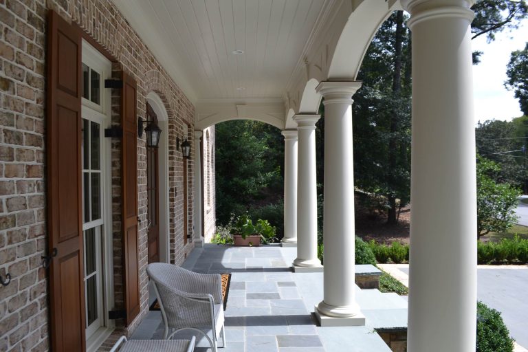 Inspiration for a mid-sized timeless tile front porch remodel in Atlanta with a roof extension by RGROVE Design Studio, Inc. | Outdoor Photos | Porch | Landscaping | Landscape Design | Outdoor Living Space | Porch Design Ideas | Outdoor Living Space Ideas | Backyard Design