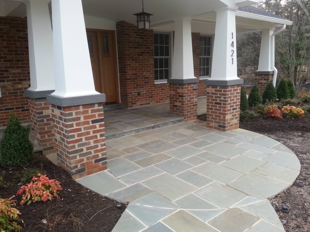 Inspiration for a mid-sized timeless tile front porch remodel in DC Metro with a roof extension by Bright Construction Group | Outdoor Photos | Porch | Landscaping | Landscape Design | Outdoor Living Space | Porch Design Ideas | Outdoor Living Space Ideas | Backyard Design