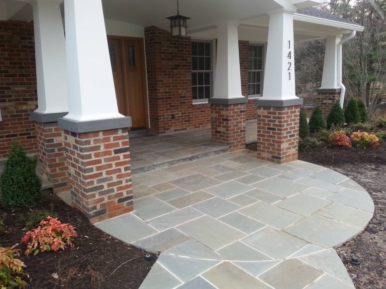 Inspiration for a mid-sized timeless tile front porch remodel in DC Metro with a roof extension by Bright Construction Group | Outdoor Photos | Porch | Landscaping | Landscape Design | Outdoor Living Space | Porch Design Ideas | Outdoor Living Space Ideas | Backyard Design