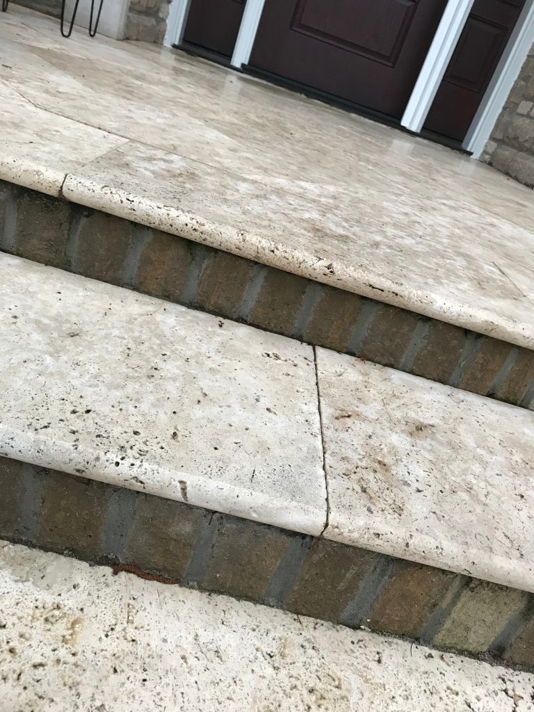 Inspiration for a mid-sized timeless tile front porch remodel in Other by Lowenoak Landscape Development | Outdoor Photos | Porch | Landscaping | Landscape Design | Outdoor Living Space | Porch Design Ideas | Outdoor Living Space Ideas | Backyard Design