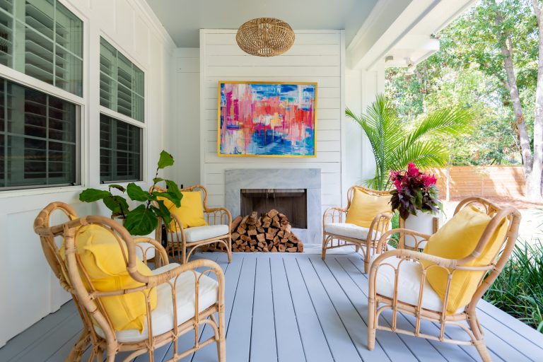 Inspiration for a mid-sized transitional back porch remodel in Charleston with a fireplace, decking and a roof extension by Hallmark Floors | Outdoor Photos | Porch | Landscaping | Landscape Design | Outdoor Living Space | Porch Design Ideas | Outdoor Living Space Ideas | Backyard Design