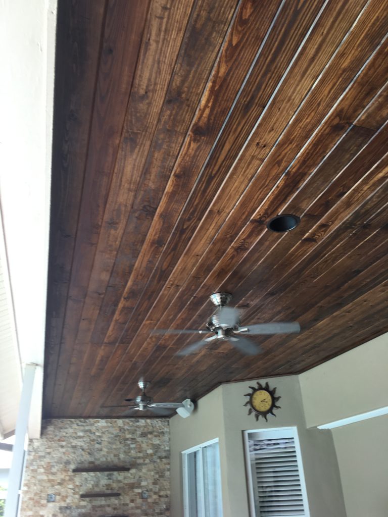 Inspiration for a mid-sized transitional back porch remodel in Tampa with a roof extension by Outdoor Kitchen, Pool & Pavers | Outdoor Photos | Porch | Landscaping | Landscape Design | Outdoor Living Space | Porch Design Ideas | Outdoor Living Space Ideas | Backyard Design