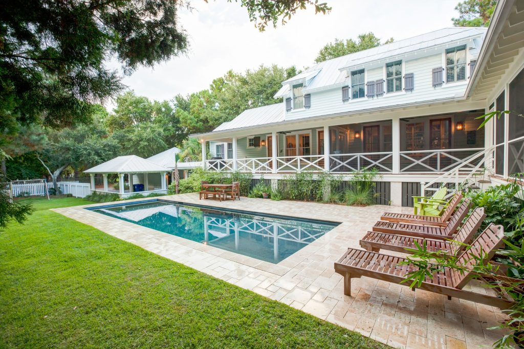 Inspiration for a mid-sized transitional backyard rectangular pool remodel in Charleston