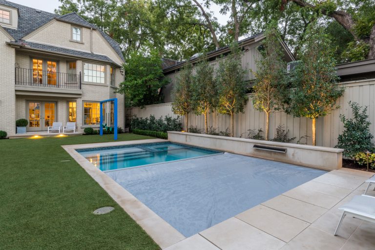 Inspiration for a mid-sized transitional backyard stone and rectangular lap hot tub remodel in Dallas