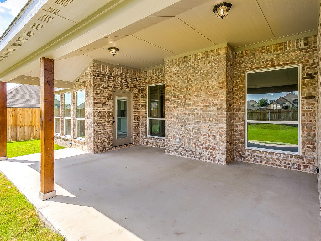 Inspiration for a mid-sized transitional concrete back porch remodel in Dallas with a roof extension by Stockon 5 Construction LLC | Outdoor Photos | Porch | Landscaping | Landscape Design | Outdoor Living Space | Porch Design Ideas | Outdoor Living Space Ideas | Backyard Design