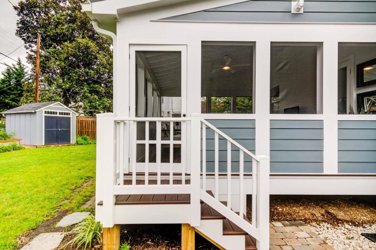 Inspiration for a mid-sized transitional screened-in back porch remodel in DC Metro with decking and a roof extension by Atlas Moran Construction | Outdoor Photos | Porch | Landscaping | Landscape Design | Outdoor Living Space | Porch Design Ideas | Outdoor Living Space Ideas | Backyard Design