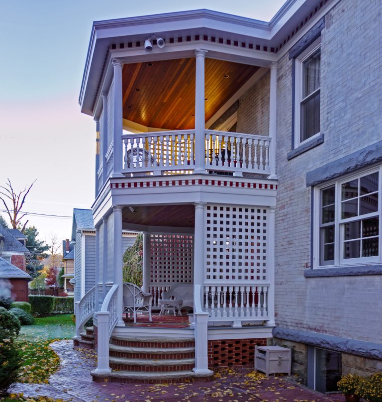 Inspiration for a mid-sized transitional stamped concrete side porch remodel in New York with a roof extension by Jay Eckert Construction Inc. | Outdoor Photos | Porch | Landscaping | Landscape Design | Outdoor Living Space | Porch Design Ideas | Outdoor Living Space Ideas | Backyard Design