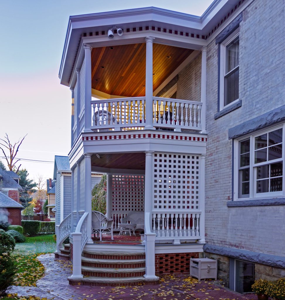 Inspiration for a mid-sized transitional stamped concrete side porch remodel in New York with a roof extension by Jay Eckert Construction Inc. | Outdoor Photos | Porch | Landscaping | Landscape Design | Outdoor Living Space | Porch Design Ideas | Outdoor Living Space Ideas | Backyard Design