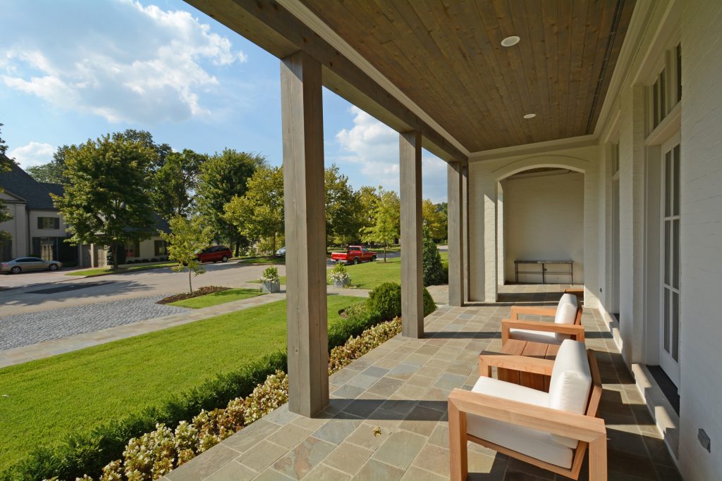 Inspiration for a mid-sized transitional stone front porch remodel in Other with a roof extension by Shapiro & Company Architects | Outdoor Photos | Porch | Landscaping | Landscape Design | Outdoor Living Space | Porch Design Ideas | Outdoor Living Space Ideas | Backyard Design