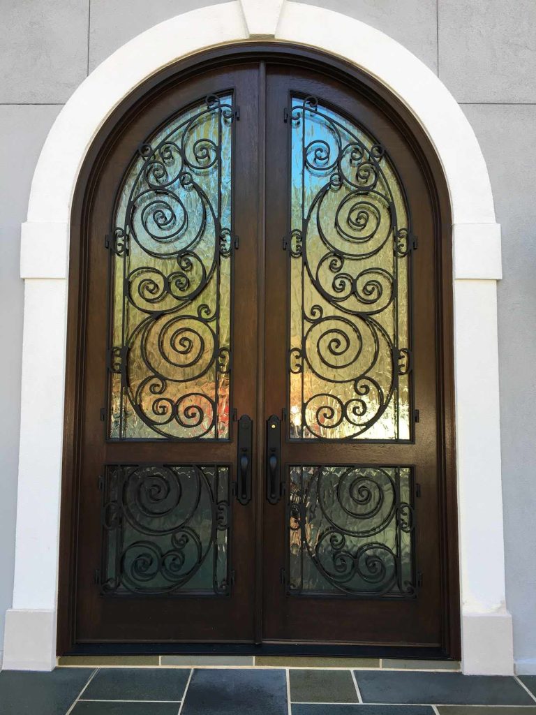 Inspiration for a mid-sized victorian tile front porch remodel in Raleigh with a roof extension by Southern Custom Doors | Outdoor Photos | Porch | Landscaping | Landscape Design | Outdoor Living Space | Porch Design Ideas | Outdoor Living Space Ideas | Backyard Design