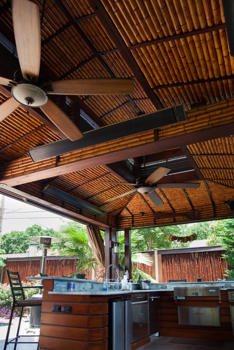 Inspiration for a mid-sized zen backyard patio kitchen remodel in Dallas with a gazebo